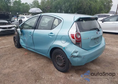 2013 Toyota Prius C One from USA, damaged, VIN JTDKDTB36D1052383